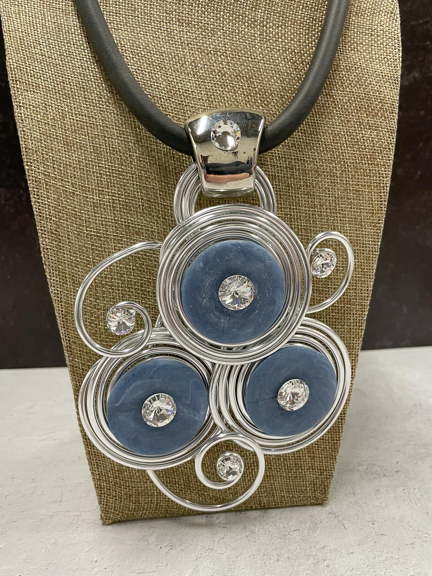 Jeff Lieb Total Design Jewelry Trio Resin & Wire Pendant Rubber Cord Necklace, Blue - Statement Boutique