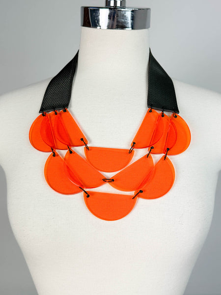 Premium AI Image | Statement necklace made up of orange and black beads and  tassels Polynesian tribal motifs and designs unique piece of tribal ethnic  fashion Polynesian artistry