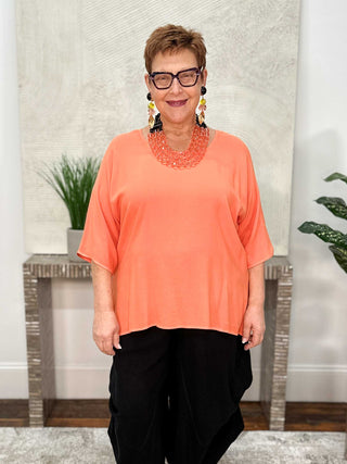 Dairi Imports Curved High Low Top, Tangerine - Statement Boutique