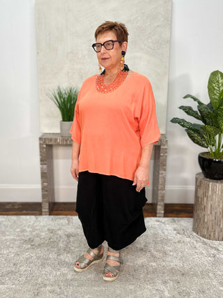 Dairi Imports Curved High Low Top, Tangerine - Statement Boutique