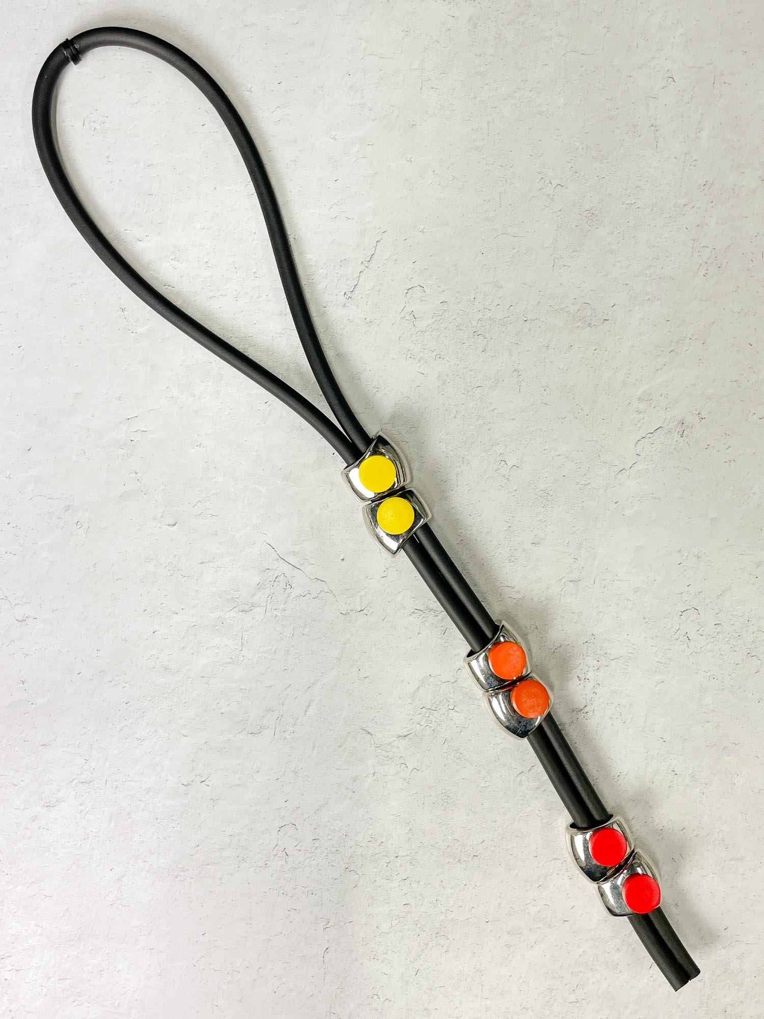 Jeff Lieb Total Design Jewelry Reversible Long Rubber Y Drop Necklace, Silver/Orange Multi - Statement Boutique