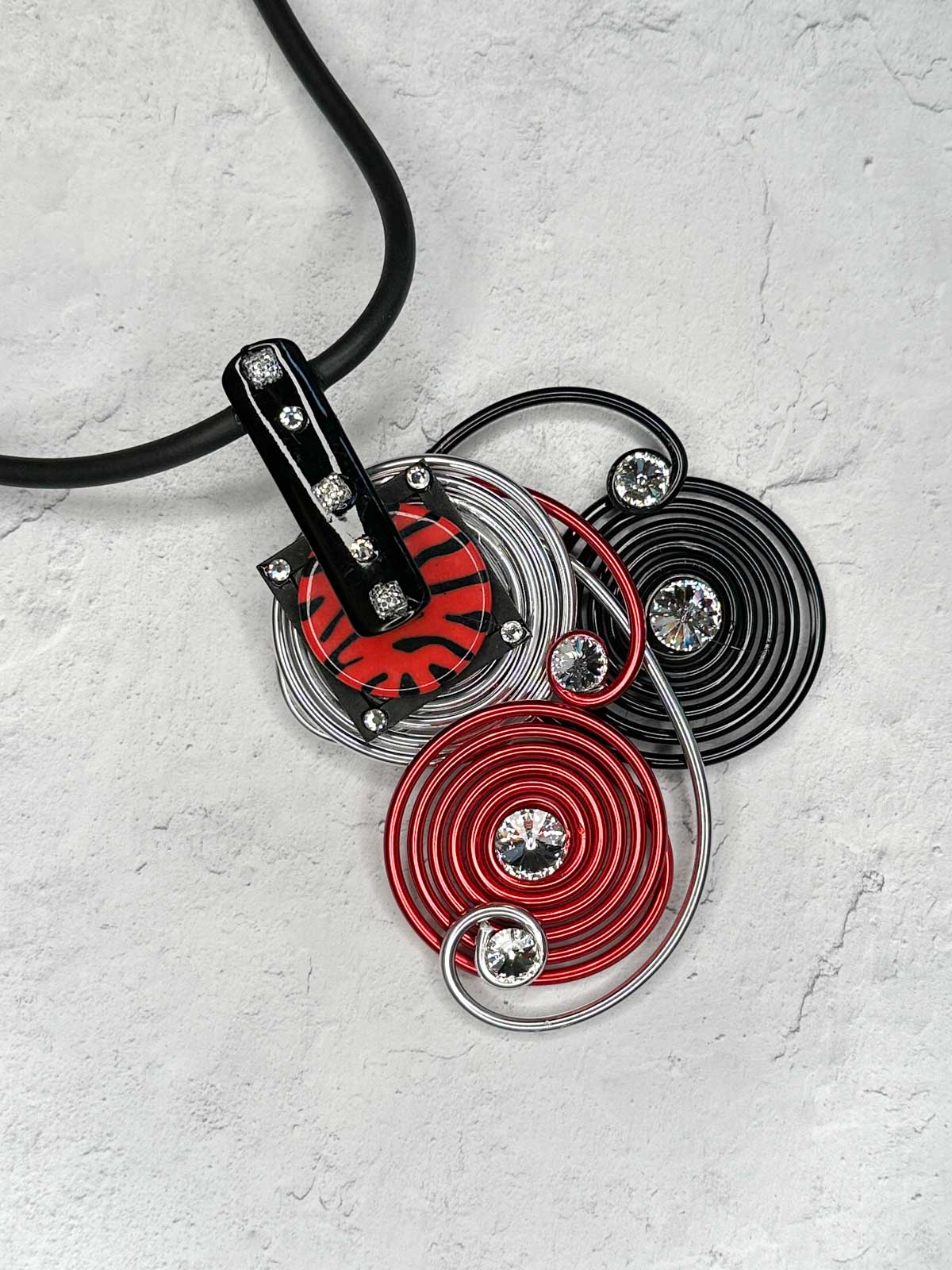 Jeff Lieb Total Design Jewelry Stripe Accent Trio Wire Pendant Necklace, Red/Silver/Black - Statement Boutique