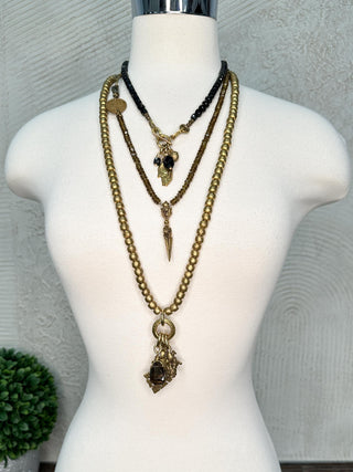 Small Black Bead Necklace with Gold Hand and Other Pendants